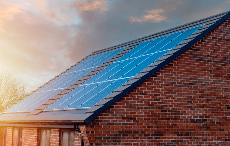 in-roof solar panels during sunset