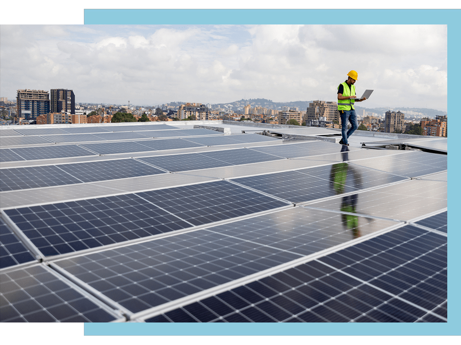 auto-dealer-solar-panels-min solar pv panels on roof with maintenance man