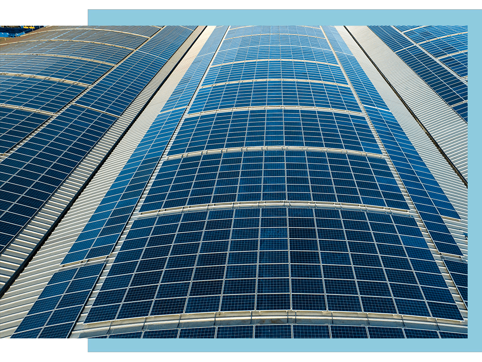 commercial-pv-panels-on-roof-min solar pv panels on roof of factory