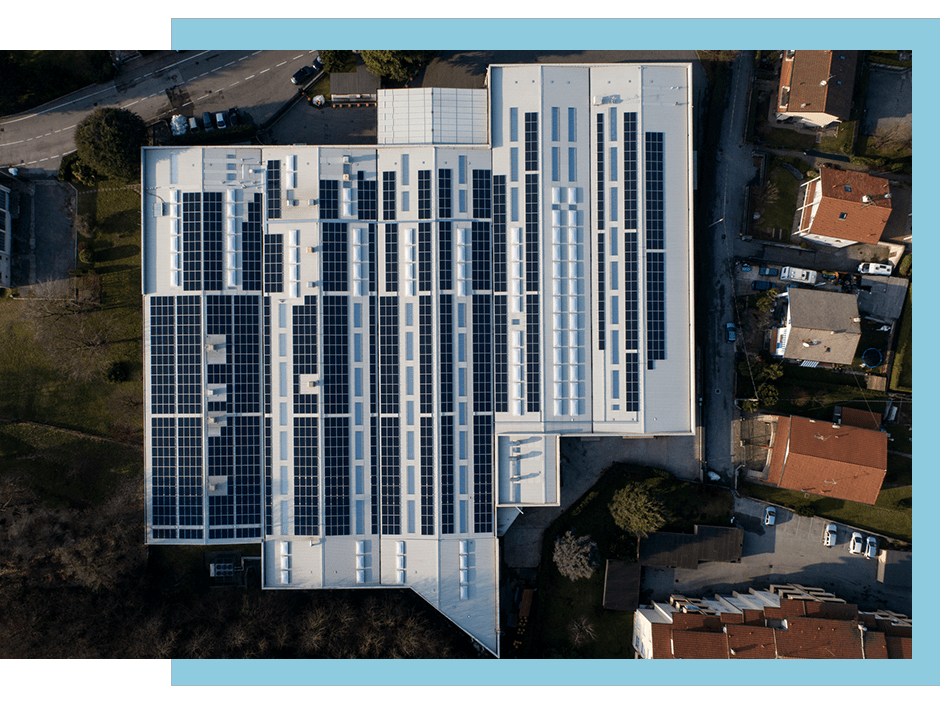 commercial solar panels on roof of building