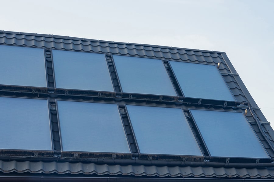 8 Solar Thermal Panels on Grey Roof